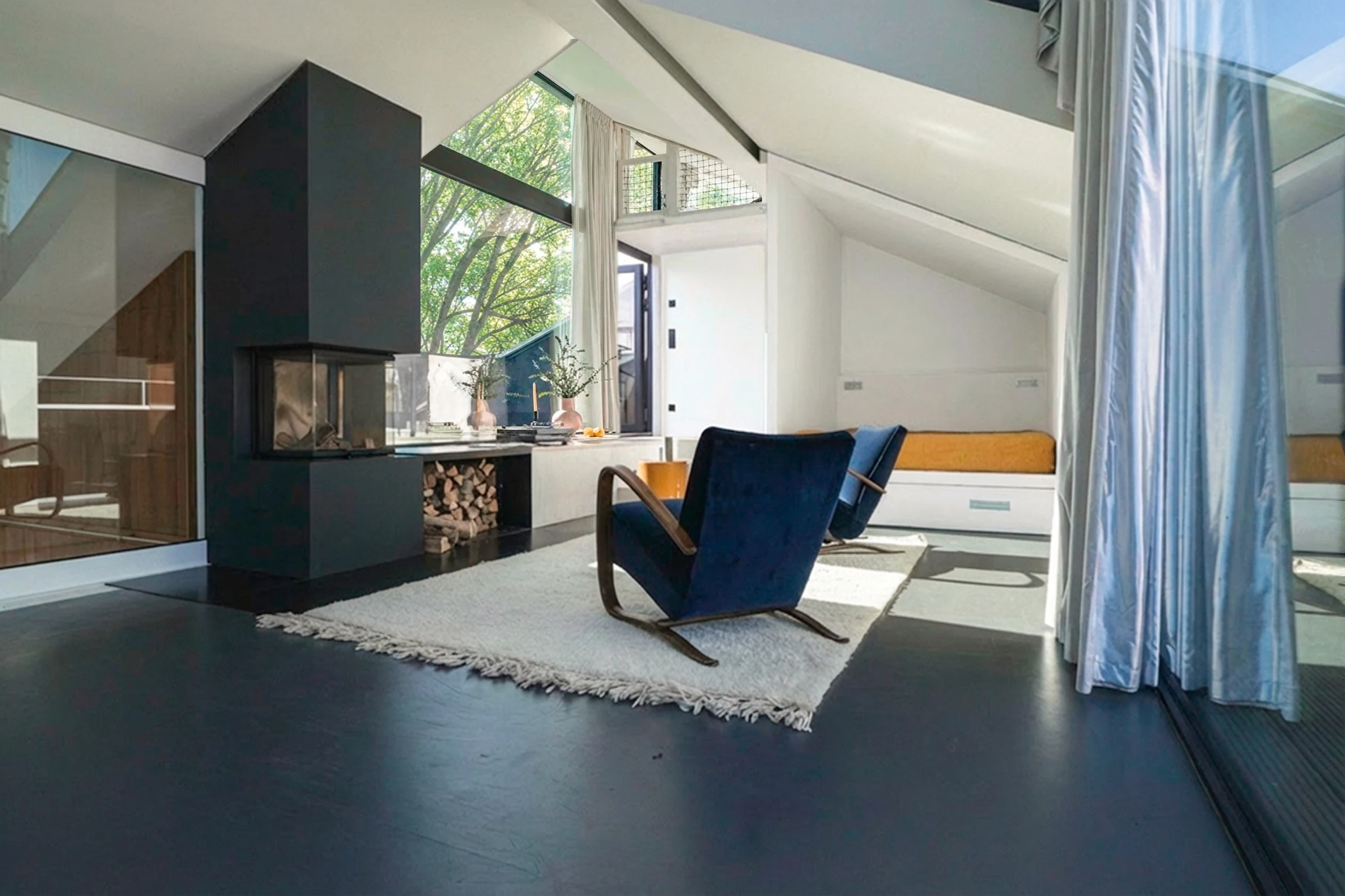 Lounge corner with curtain and fireplace